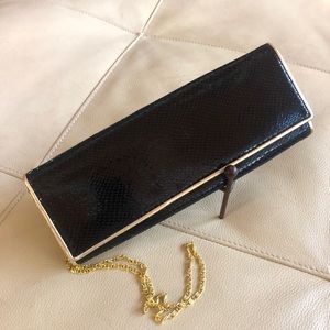 Snakeskin clutch 🥂